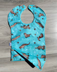 Loutres _ Bavette imperméable évolutive 5 à 12 mois