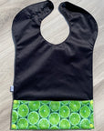 Bavette imperméable évolutive 1 à 4 ans : noire et limes