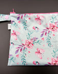 Sac imperméable, format sandwich avec ganse : papillons et fleurs
