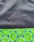 Bavette imperméable évolutive 1 à 4 ans : noire et limes