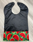 Bavette imperméable évolutive 1 à 4 ans : noire et melons