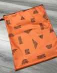 Grand sac imperméable wetbag: formes géométriques sur fond orange