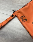Grand sac imperméable wetbag: formes géométriques sur fond orange