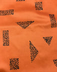 Grand sac imperméable wetbag: formes géométriques sur fond orange