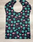 Flamants roses fond noir _ Bavette imperméable évolutive 5 à 12 mois
