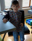 Animaux forêt fond bleu _ Bavette imperméable évolutive 1 à 4 ans