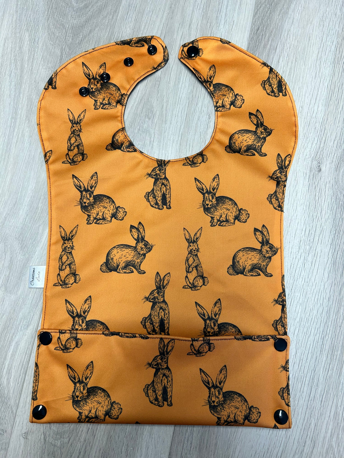 Bavette imperméable évolutive 1 à 4 ans :  lapins