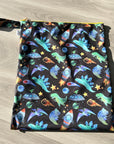 Grand sac imperméable wetbag : dinos dans l’espace