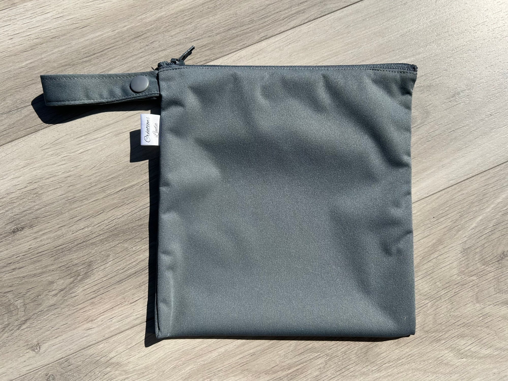 Sac imperméable, format sandwich avec ganse :  gris uni