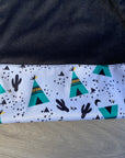 Bavette imperméable évolutive 1 à 4 ans :  noire et tipis