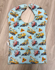 Véhicules lourds  _ Bavette imperméable évolutive 5 à 12 mois