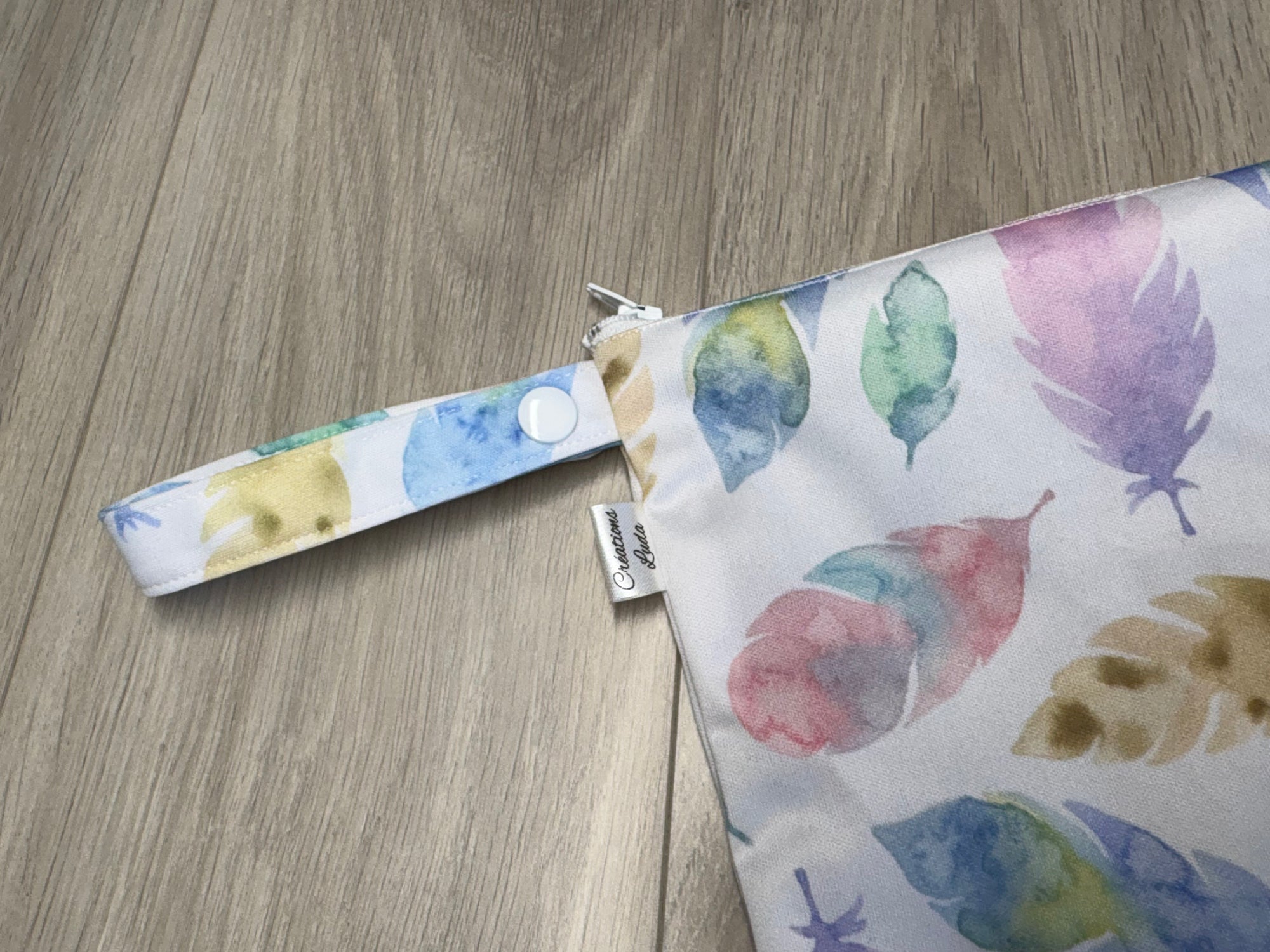 Sac imperméable, format moyen  : plumes