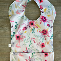 Bavette imperméable évolutive 1 à 4 ans : fleurs roses