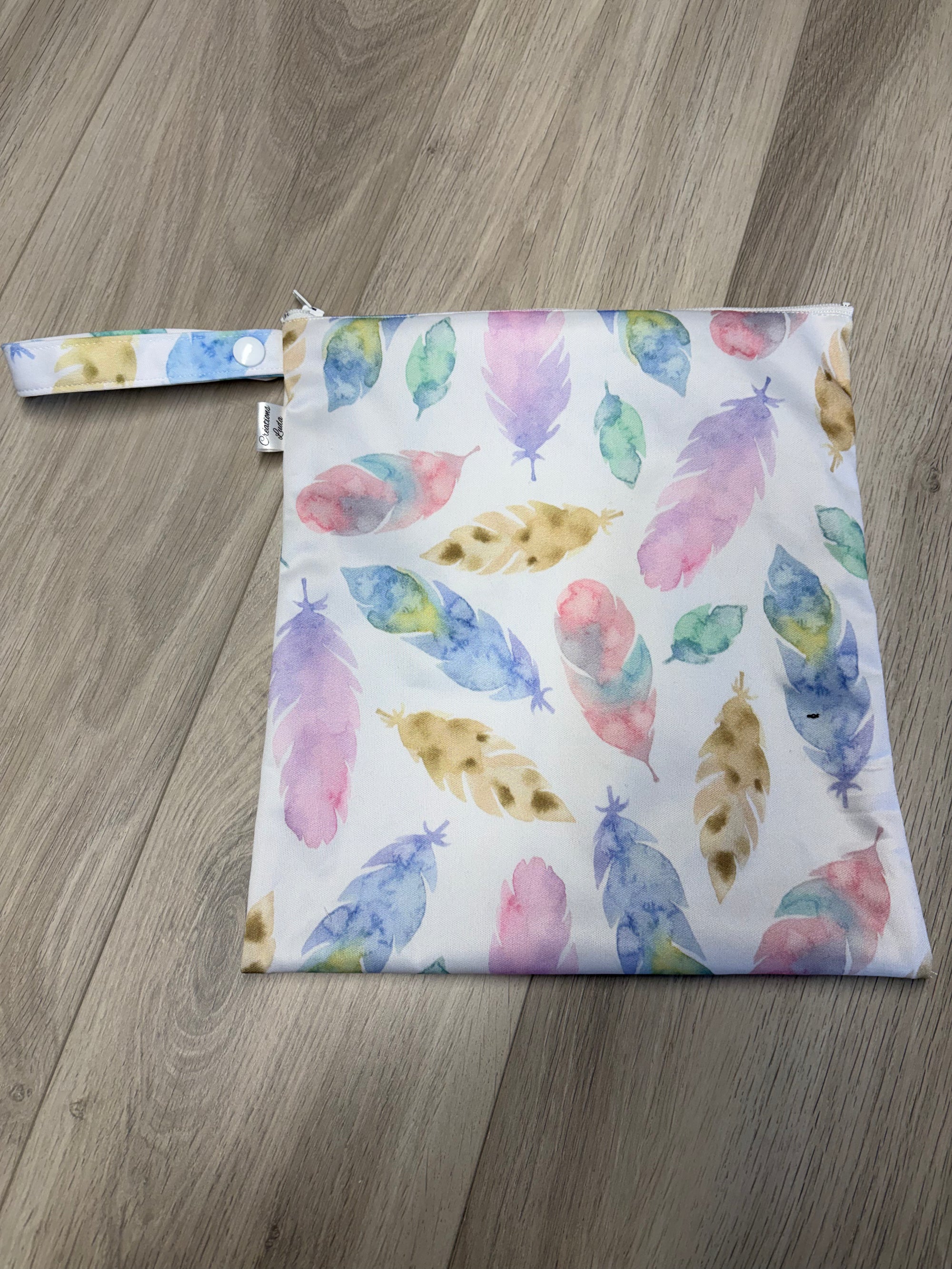 Sac imperméable, format moyen  : plumes